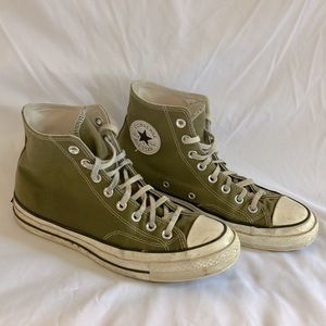 Used olive chuck taylor all star converse with some wear